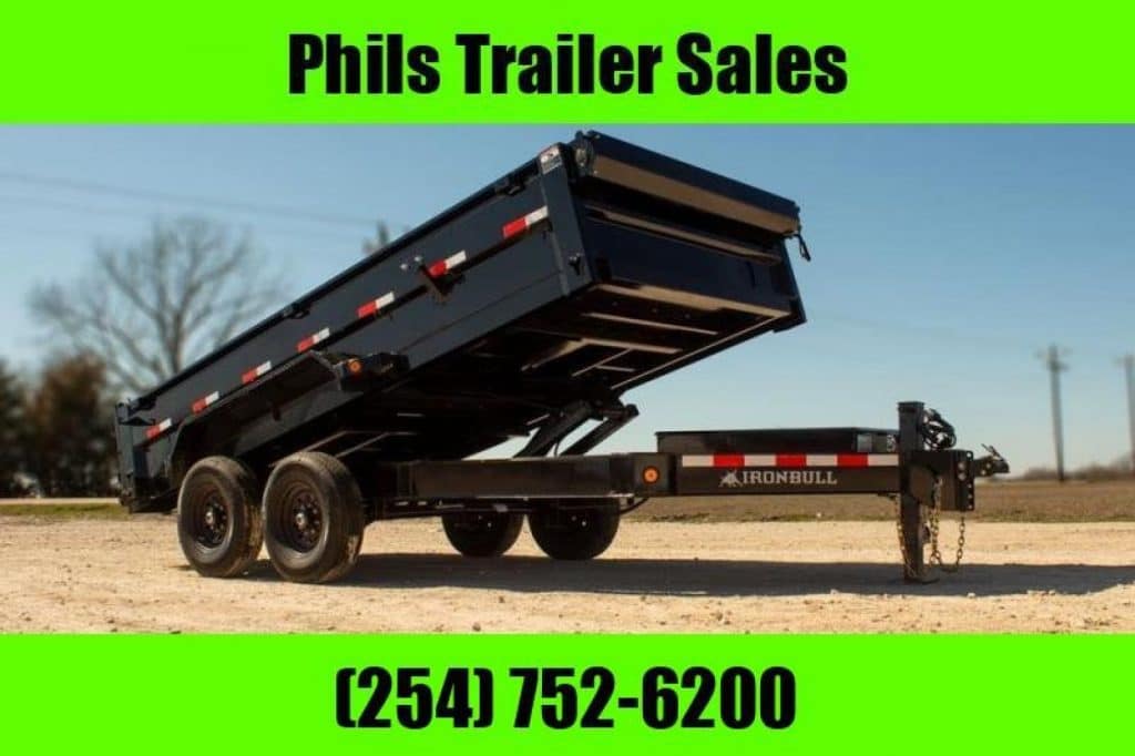 2026 Iron Bull 83x16 dump trailer in black, rear view with ramp up at Phil's Trailer Sales.