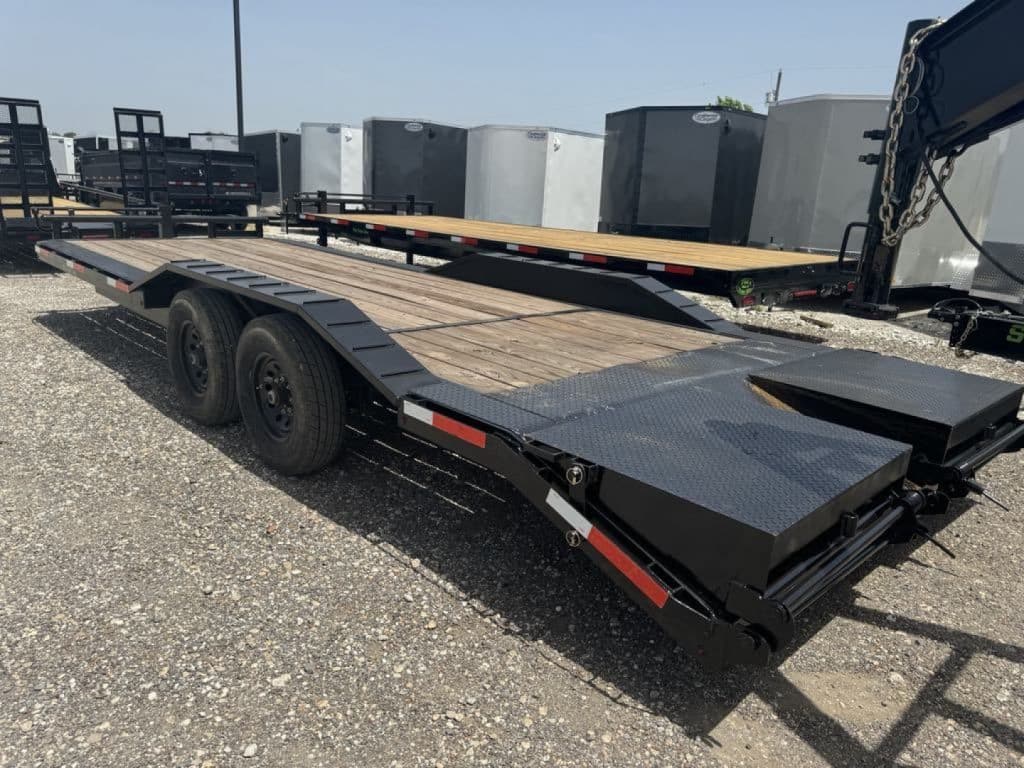 2026 Stanley Trailers 102x24 Equipment Hauler trailer in black, side view showing open deck design.