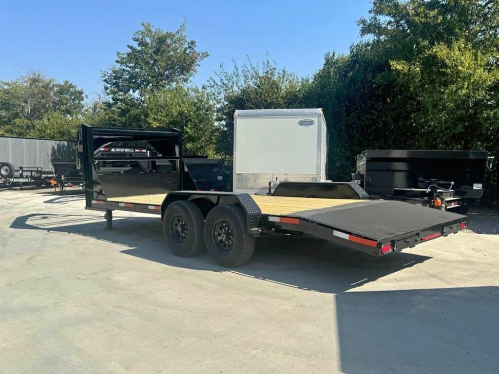 2025 Stanley Trailers 83X20 Gooseneck 14K Equipment Trailer in black, rear three-quarter view