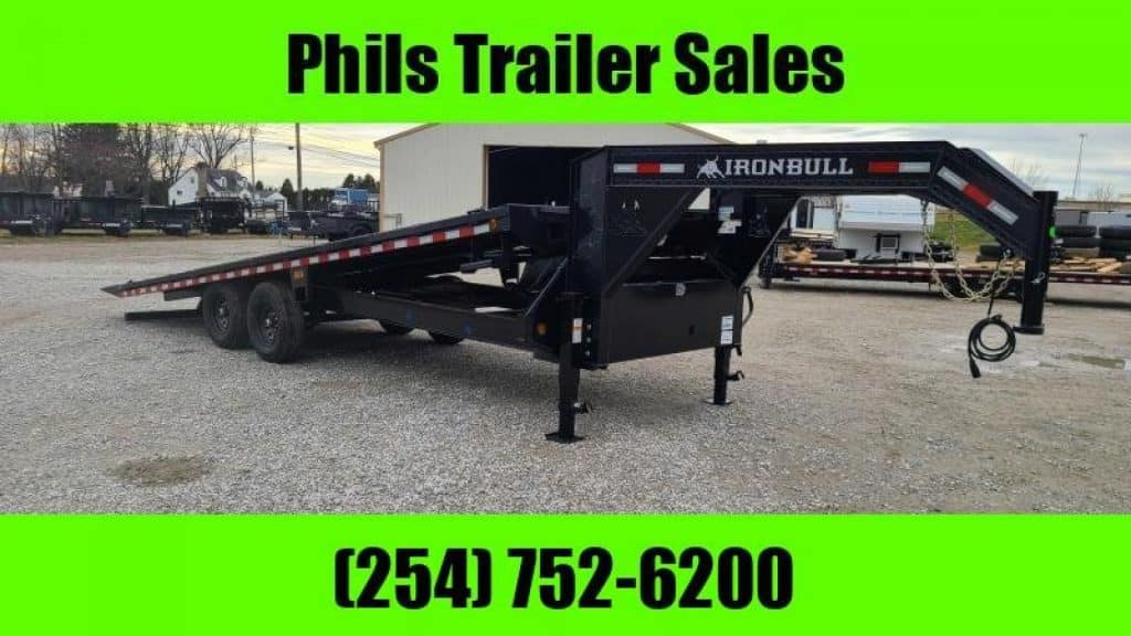2026 Iron Bull 26' tilt gooseneck trailer in black, side view showing ramp in lowered position.