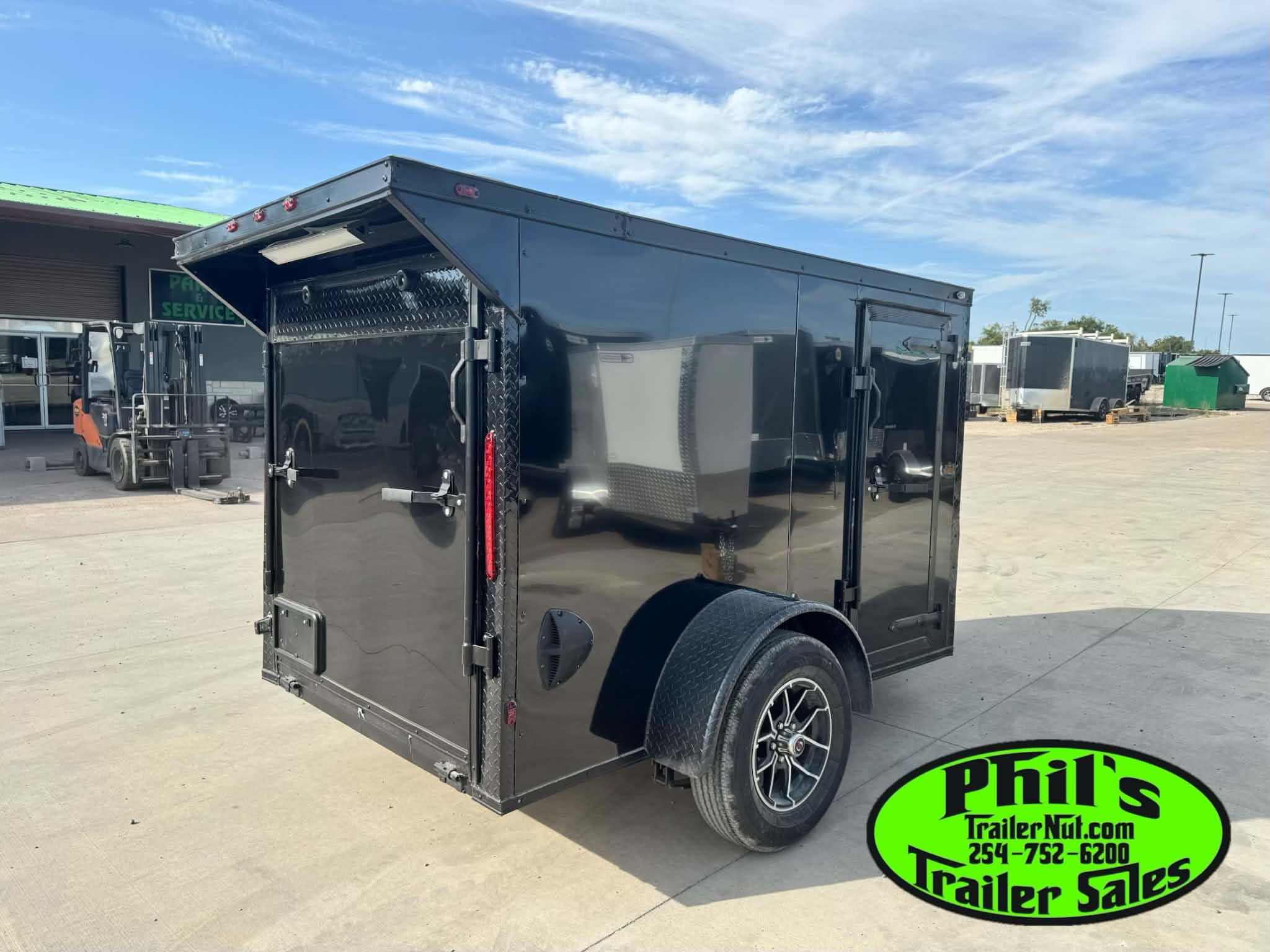 2026 5 x 8 ENCLOSED TRAILER WITH ALUMINUM WHEEL UPGRADE &REAR WING!